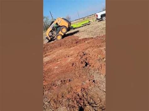 what does tipping angle on a skid steer mean|tipping on sloping ground.